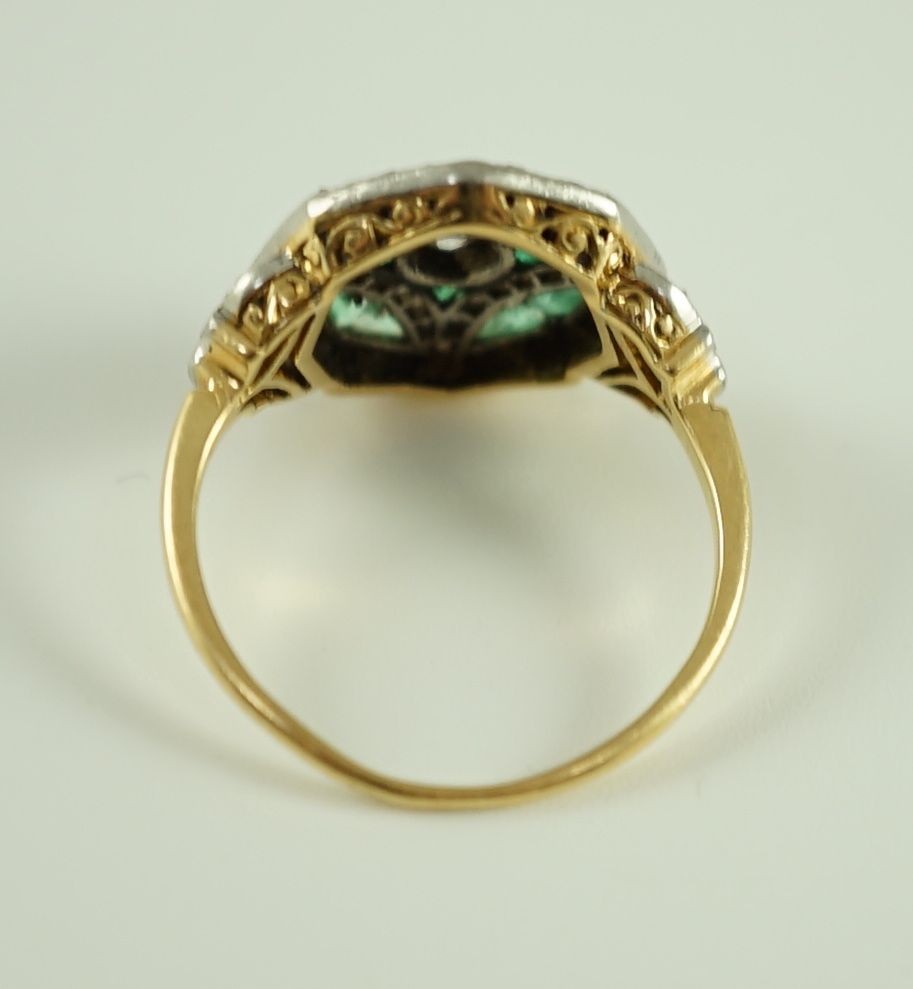 A Belle Epoque gold, emerald and diamond cluster set octagonal dress ring
